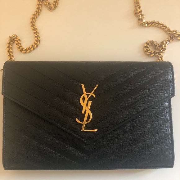 large monogram quilted leather wallet on a chain saint laurent